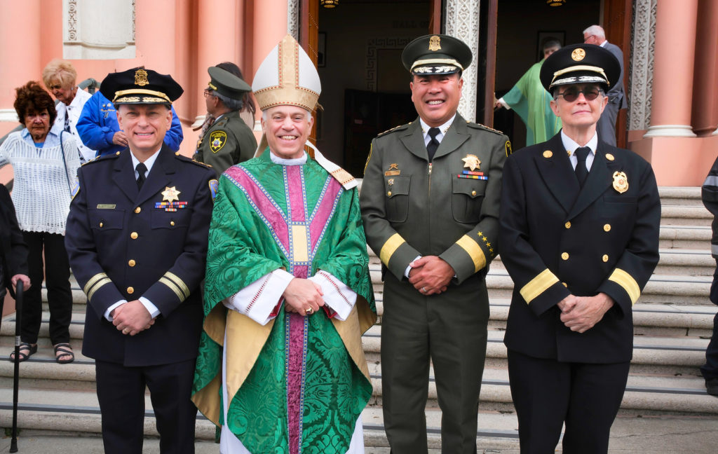 Pictured at the 2023 Policed-Fire Sheriff Mass is Assistant Police Chief Lazar, Archbishop Salvatore J. Cordileone, Sheriff Paul Miyamoto, and Fire Chief Jeanine Nicholson.
